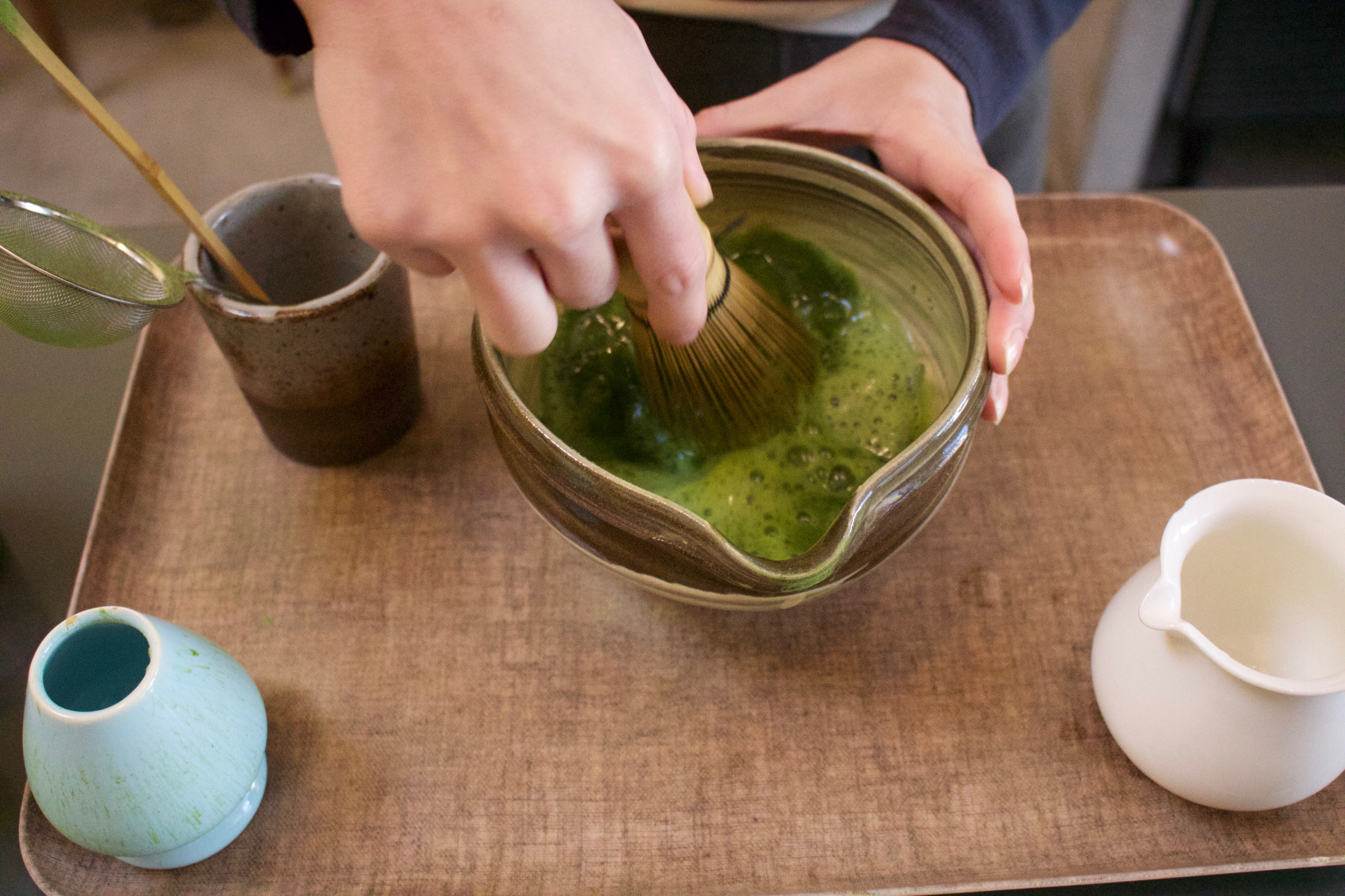 Making a Matcha tea in a bowl