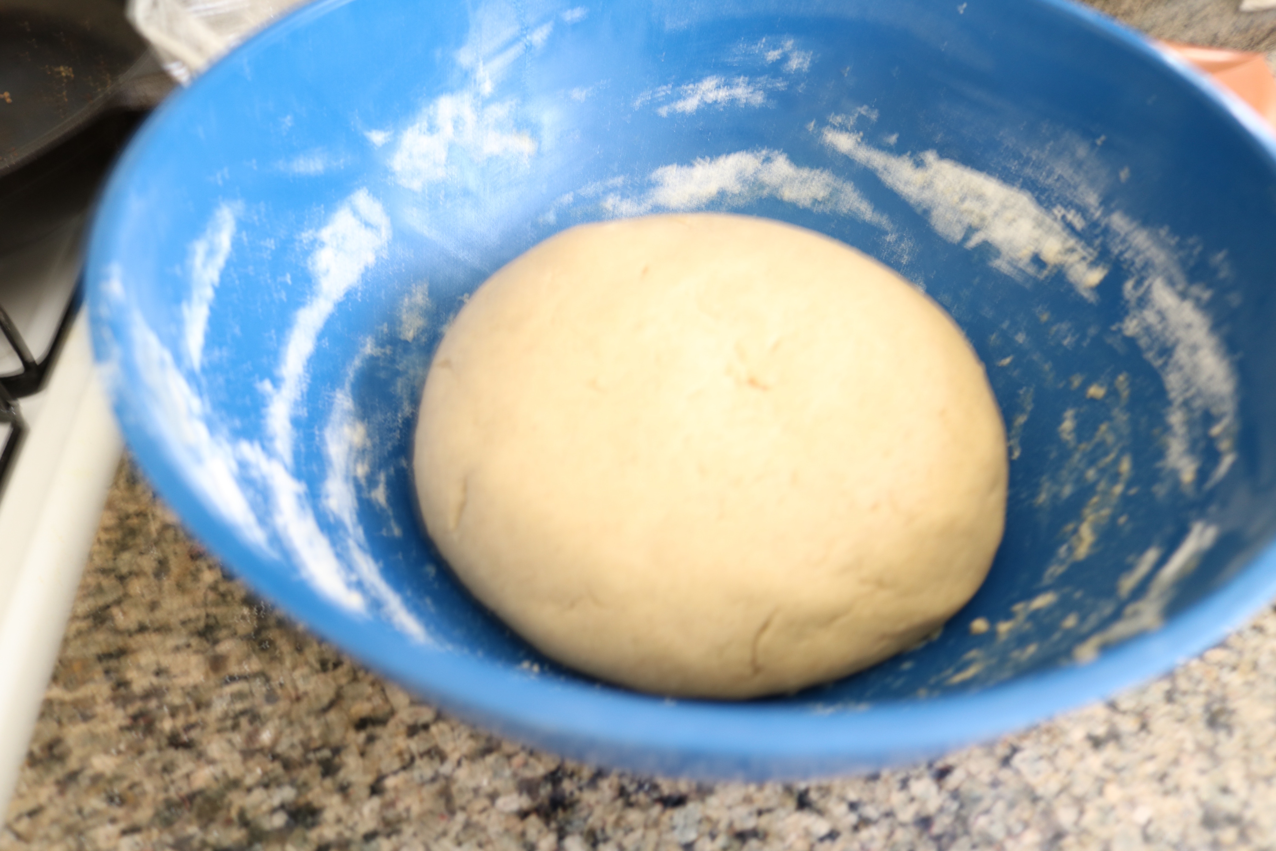 kneading bread and waiting for it to rise